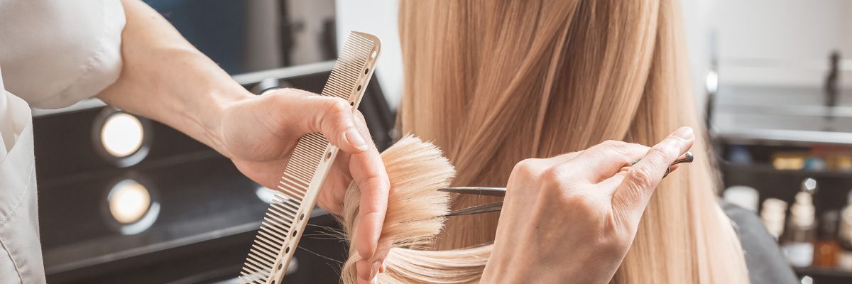 Woman with beautiful wavy hair and brown eyes